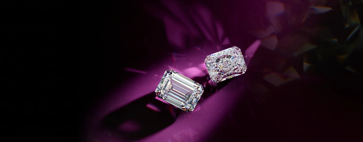 emerald cut and radiant cut loose diamonds on purple background