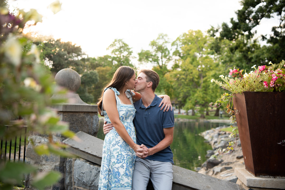 engaged couple embracing