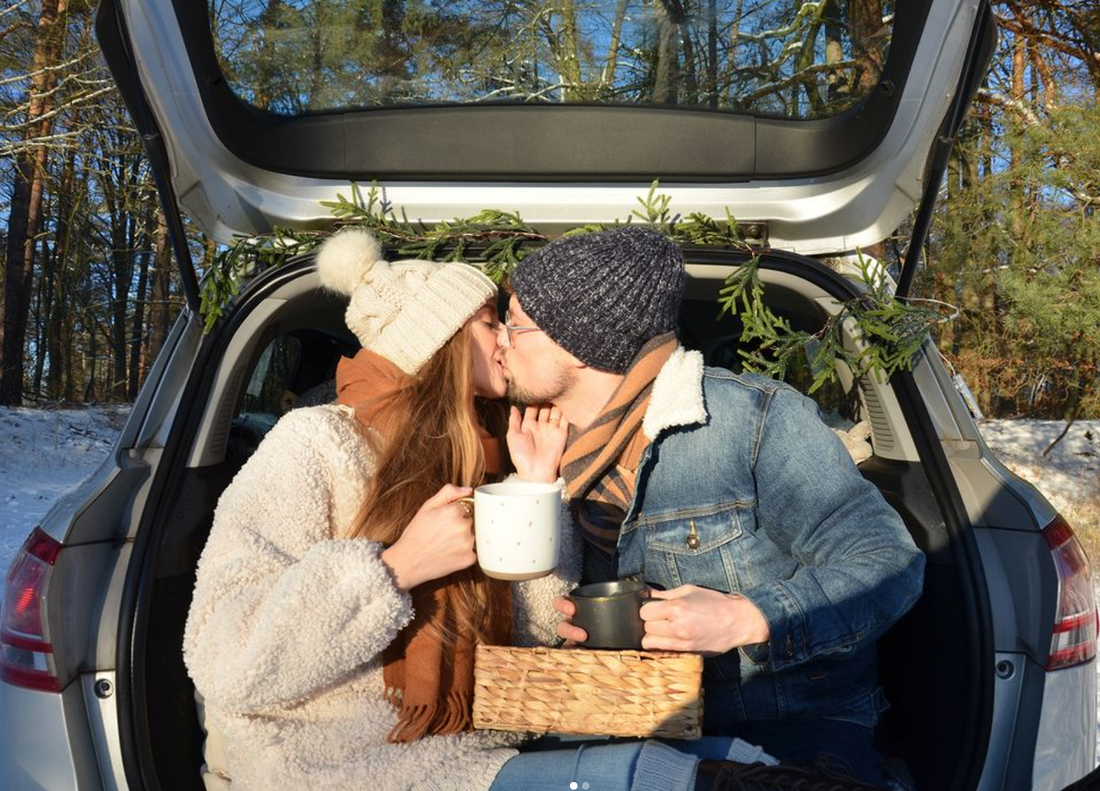 engaged couple embracing in winter