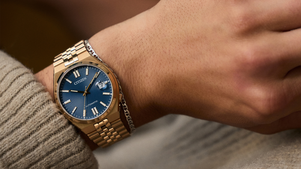 citizen watch on mans wrist
