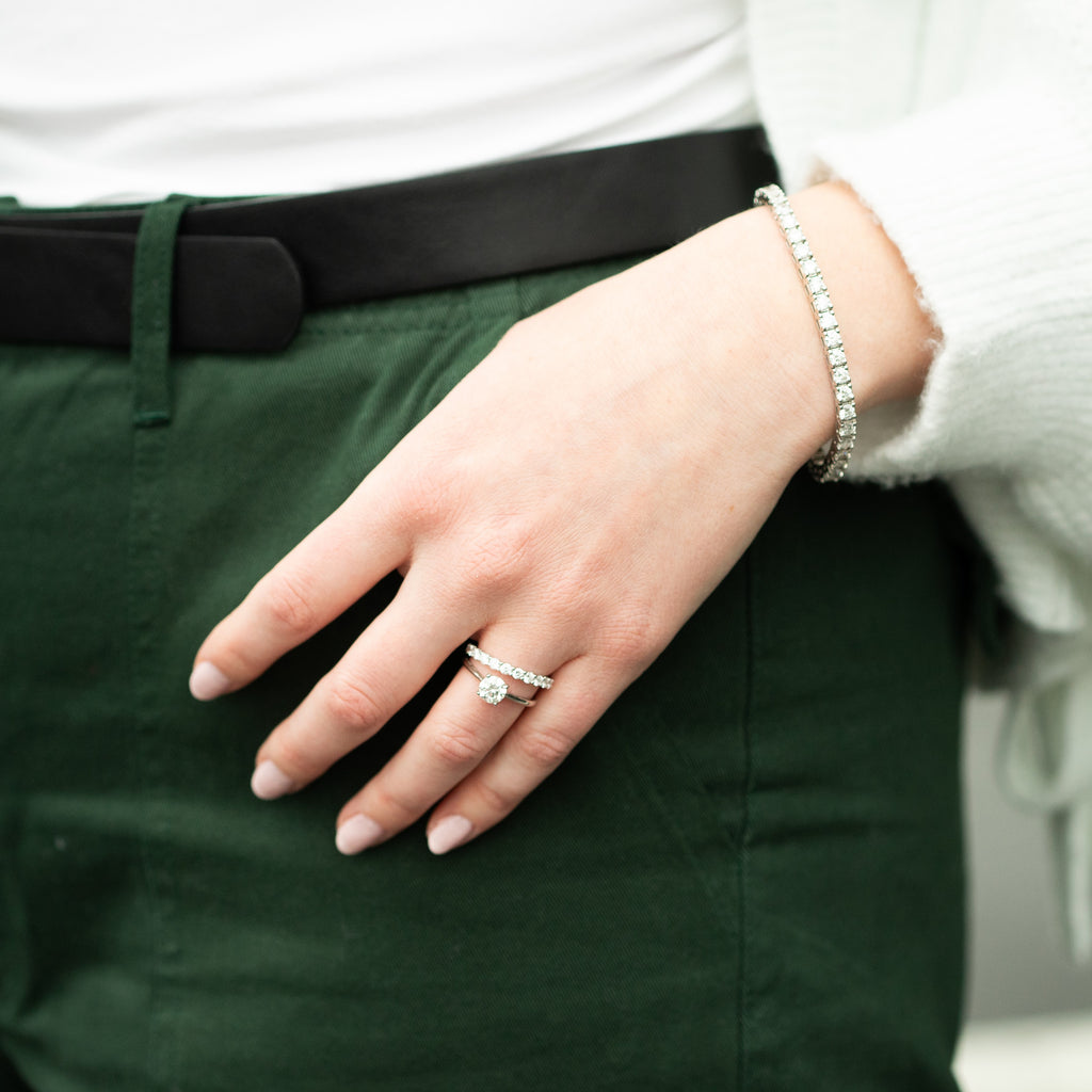 Woman Shown Wearing Diamond Jewelry Rings and Bracelet