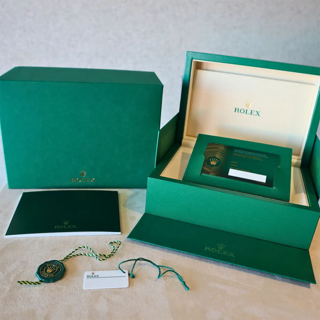 Rolex box with paperwork and tags