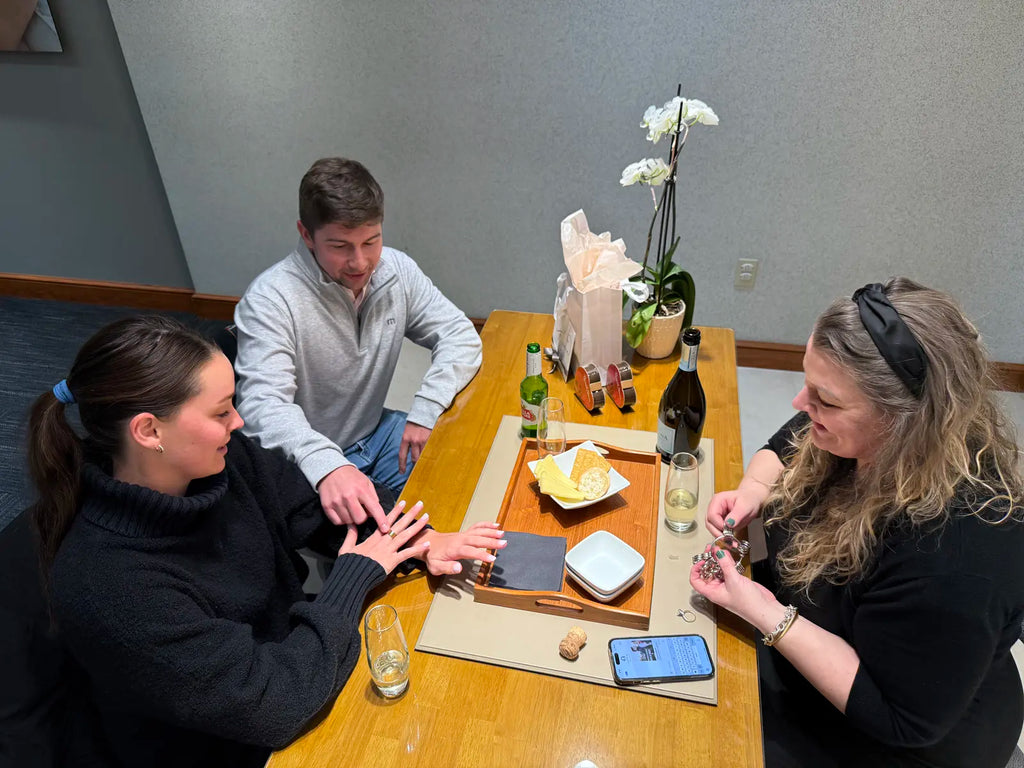 couple looking at wedding bands