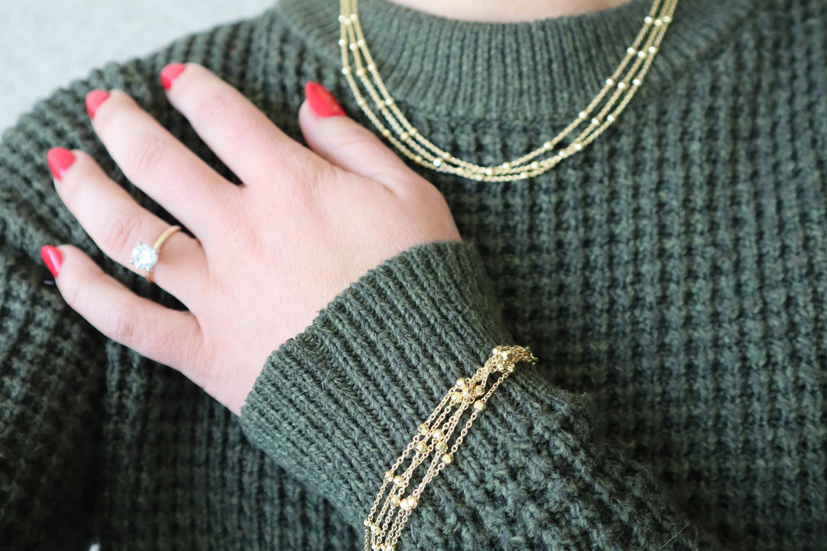 $100 special gold bracelet and necklace